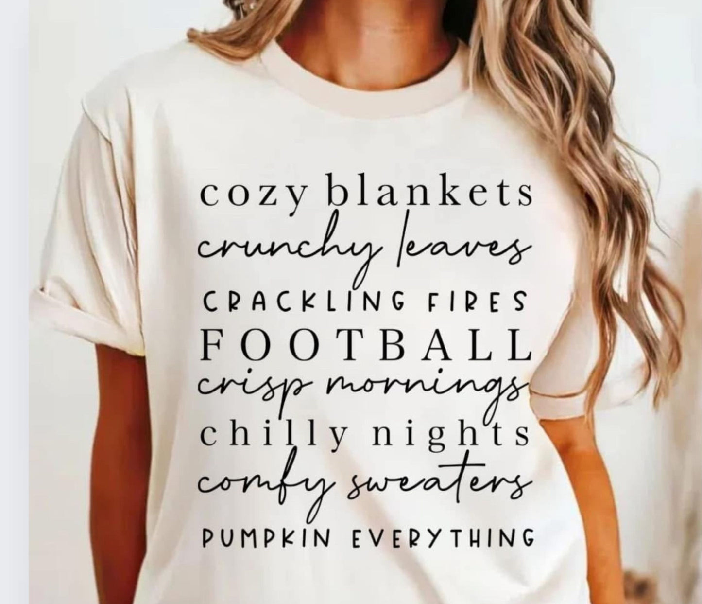 Cozy Blankets Fall Vibes T-Shirt β Autumn Graphic Tee with cozy blankets, crunchy leaves, football, and pumpkin everything text, cream color, women's seasonal shirt