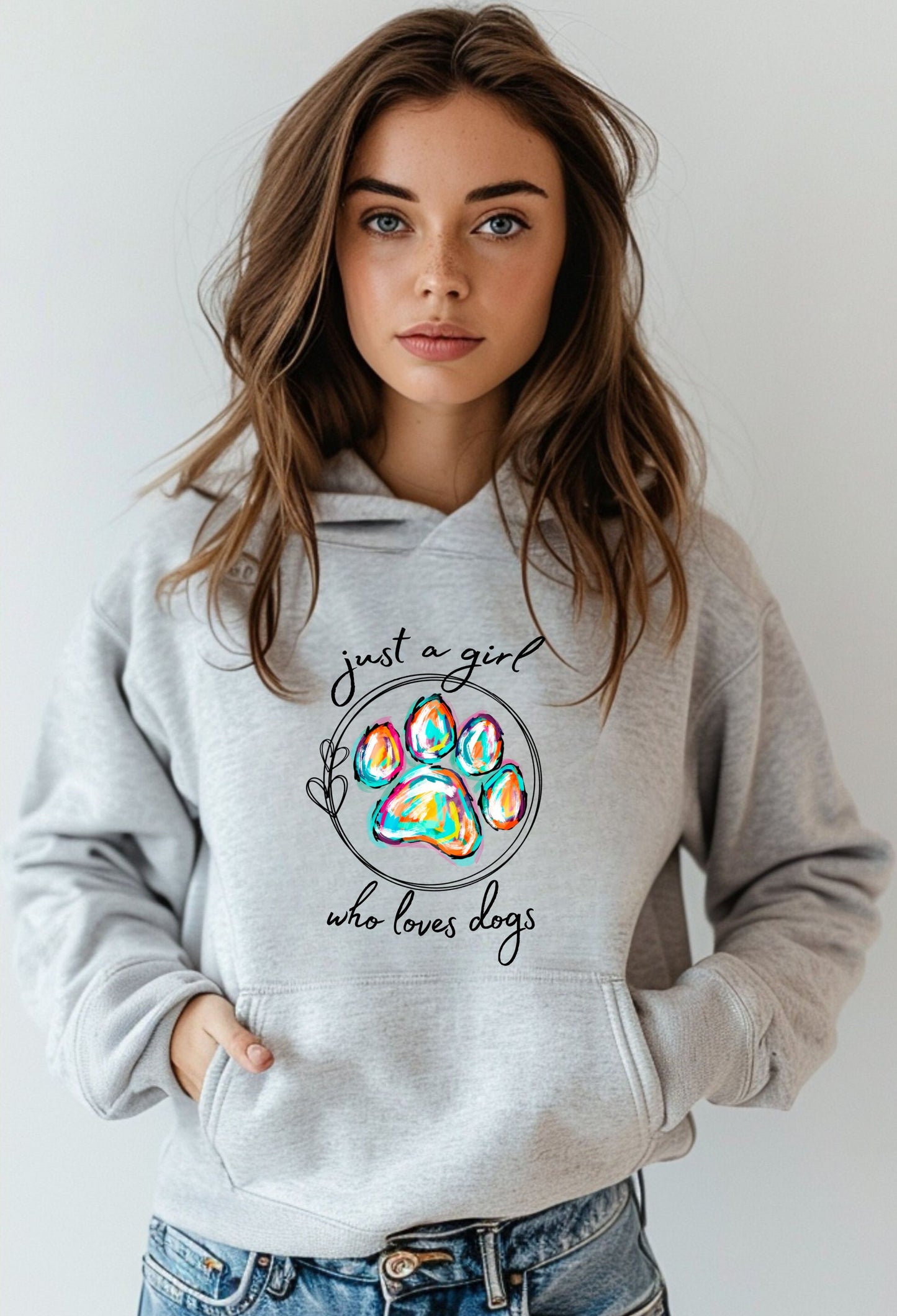 Just a Girl Who Loves Dogs hoodie with colorful paw print graphic – cozy sweatshirt for dog lovers.