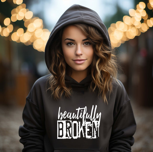 Beautifully Broken hoodie – empowerment graphic sweatshirt in black with white lettering